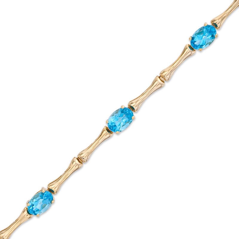 Oval Swiss Blue Topaz Bracelet in Sterling Silver with 14K Gold Plate - 7.25"|Peoples Jewellers