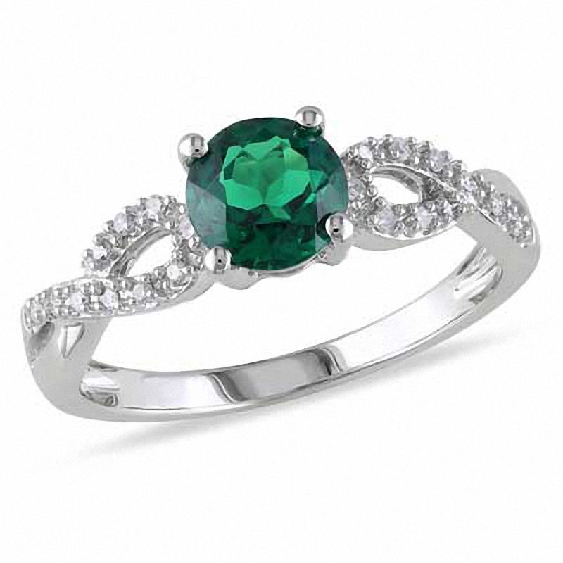 6.0mm Lab-Created Emerald and 0.08 CT. T.W. Diamond Twist Ring in 10K White Gold