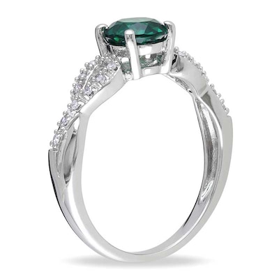 6.0mm Lab-Created Emerald and 0.08 CT. T.W. Diamond Twist Ring in 10K White Gold