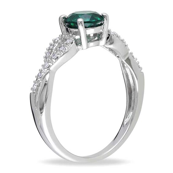 6.0mm Lab-Created Emerald and 0.08 CT. T.W. Diamond Twist Ring in 10K White Gold