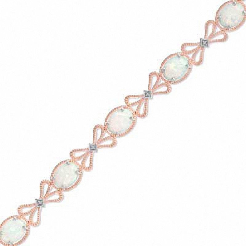 Oval Lab-Created Opal and Diamond Accent Milgrain Bow Bracelet in Sterling Silver with 14K Rose Gold Plate - 7.25"|Peoples Jewellers