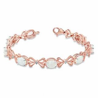 Oval Lab-Created Opal and Diamond Accent Milgrain Bow Bracelet in Sterling Silver with 14K Rose Gold Plate - 7.25"