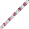 Thumbnail Image 0 of Baguette Lab-Created Ruby and White Sapphire Bracelet in Sterling Silver and 14K Gold Plate - 7.25"