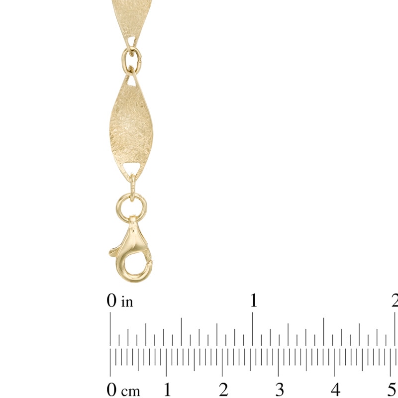 Oblong Link Twist Bracelet in 10K Gold - 7.25"