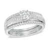 0.75 CT. T.W. Diamond Swirl Three Piece Bridal Set in 14K White Gold