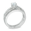 0.75 CT. T.W. Diamond Swirl Three Piece Bridal Set in 14K White Gold