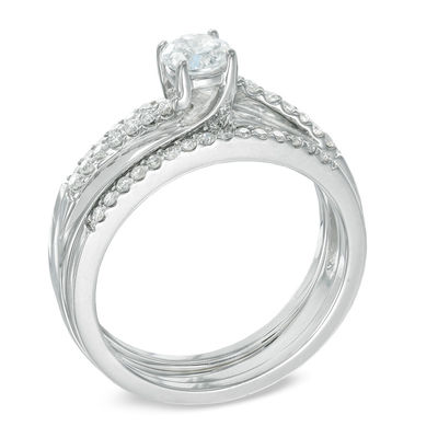 0.75 CT. T.W. Diamond Swirl Three Piece Bridal Set in 14K White Gold