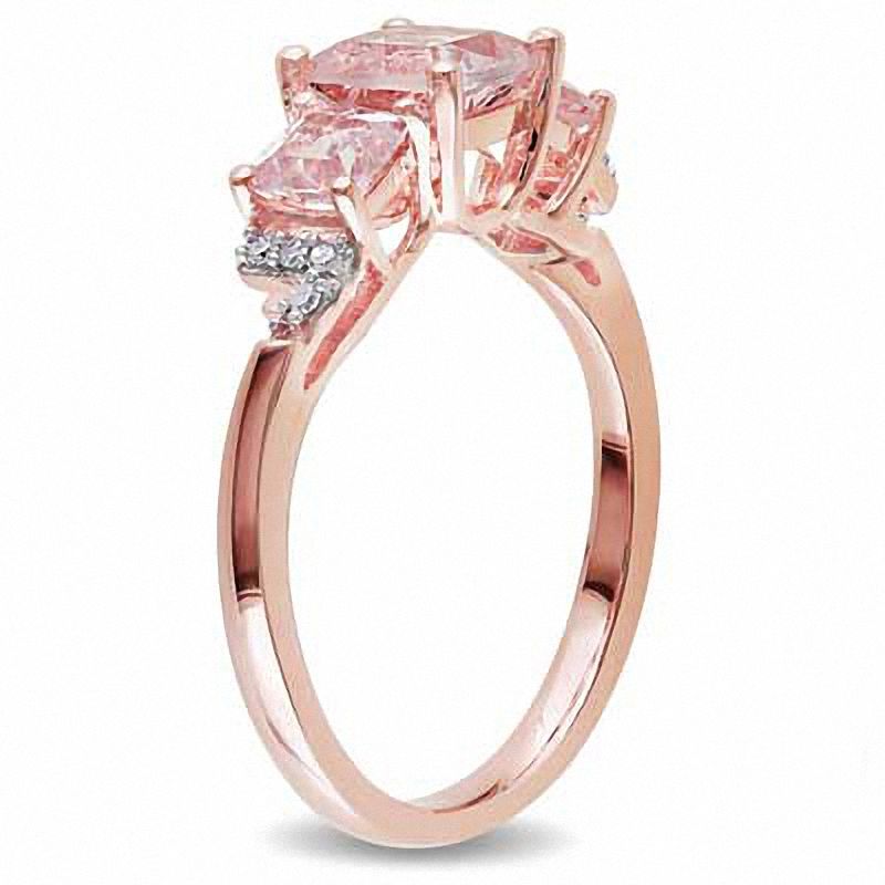 6.0mm Cushion-Cut Morganite and 0.04 CT. T.W. Diamond Three Stone Ring in Sterling Silver with Rose Rhodium|Peoples Jewellers