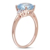 Thumbnail Image 1 of 8.0mm Cushion-Cut Sky Blue Topaz and 0.06 CT. T.W. Diamond Ring in 10K Rose Gold