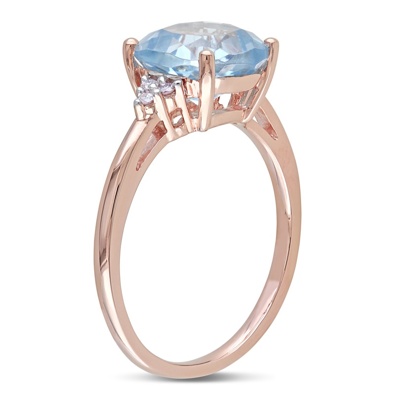 8.0mm Cushion-Cut Sky Blue Topaz and 0.06 CT. T.W. Diamond Ring in 10K Rose Gold