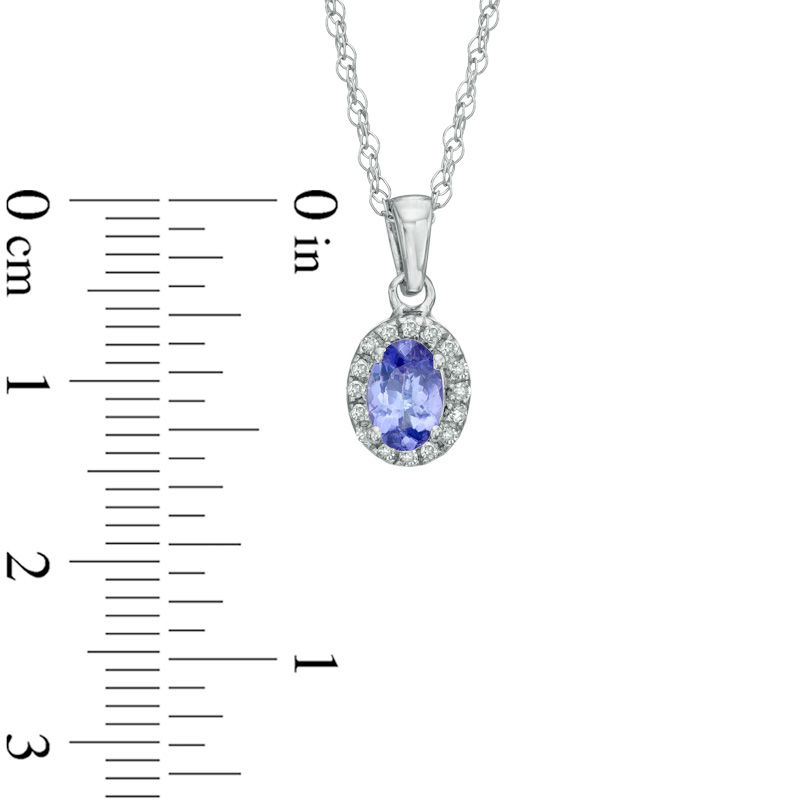 Oval Tanzanite and Diamond Accent Frame Pendant in Sterling Silver