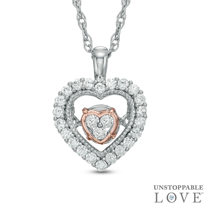 Unstoppable Love™ 0.15 CT. T.W. Diamond Heart in Heart Pendant in 10K Two-Tone Gold|Peoples Jewellers