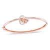 Thumbnail Image 0 of Lab-Created White Sapphire Knot Bangle in Sterling Silver with 18K Rose Gold Plate