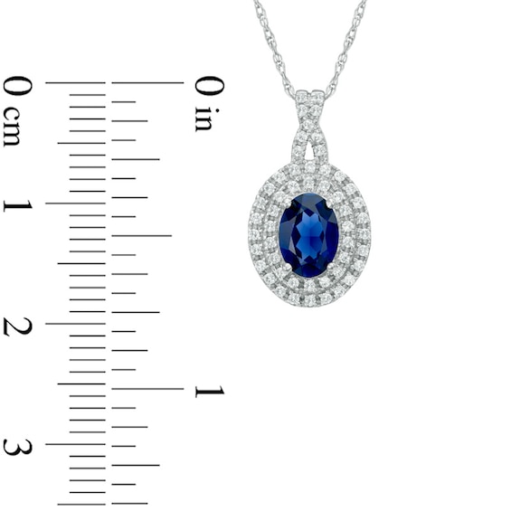 Oval Lab-Created Blue and White Sapphire Frame Pendant in 10K White Gold