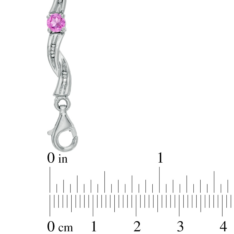 Lab-Created Pink Sapphire and Diamond Accent Twist Bracelet in Sterling Silver - 7.25"