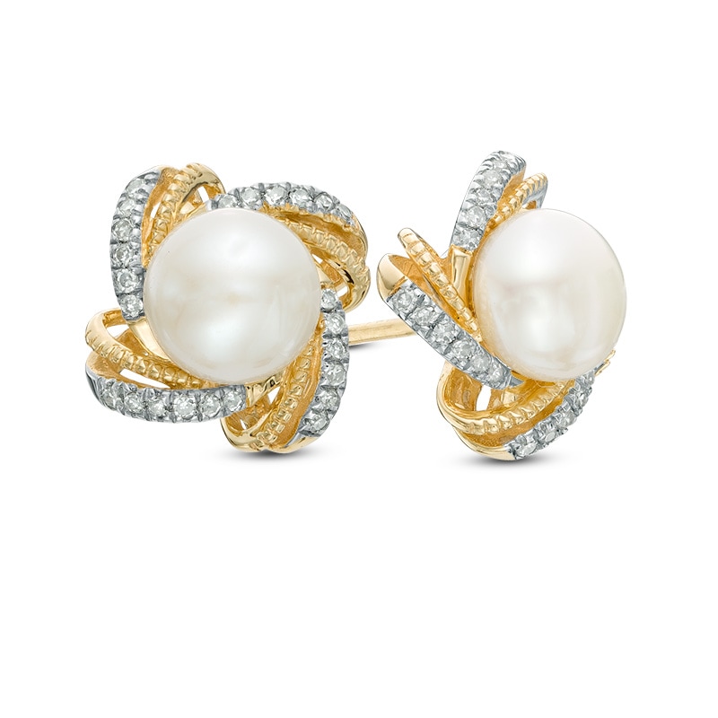 6.0mm Freshwater Cultured Pearl and 0.11 CT. T.W. Diamond Stud Earrings in 10K Gold|Peoples Jewellers