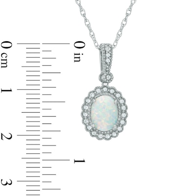 Oval Lab-Created Opal and White Sapphire Frame Pendant in Sterling Silver