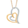 Thumbnail Image 1 of 0.11 CT. T.W. Diamond Tilted Double Heart Pendant in 10K Gold