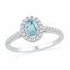 Thumbnail Image 0 of Oval Aquamarine and 0.18 CT. T.W. Diamond Frame Ring in 10K White Gold
