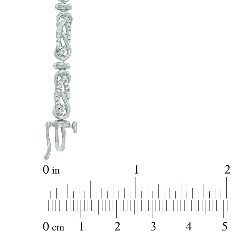 0.95 CT. T.W. Diamond Infinity Link Bracelet in 10K White Gold