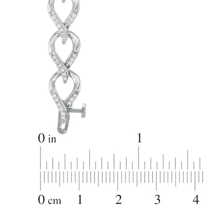 0.95 CT. T.W. Diamond Flame Link Bracelet in 10K White Gold - 7.25"