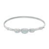 Thumbnail Image 0 of Oval Lab-Created Opal and White Sapphire Three Stone Bangle in Sterling Silver