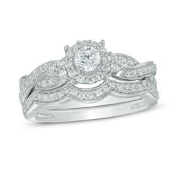 0.58 CT. T.W. Diamond Frame Twist Bridal Set in 10K White Gold