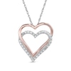 Thumbnail Image 0 of 0.09 CT. T.W. Diamond Double Heart Pendant in 10K Two-Tone Gold