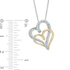 0.15 CT. T.W. Diamond Entwined Double Heart Pendant in 10K Two-Tone Gold