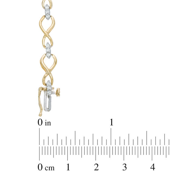 0.45 CT. T.W. Diamond Infinity Loop Bracelet in 10K Gold - 7.25"