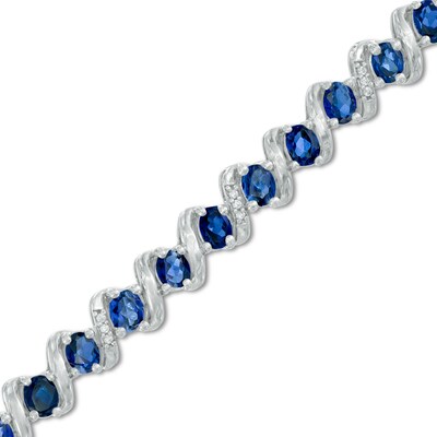 Oval Lab-Created Sapphire and 0.09 CT. T.W. Diamond Cascading Bracelet in Sterling Silver