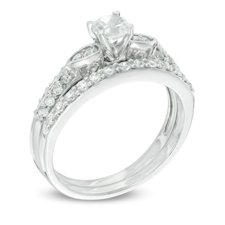 4.0mm Lab-Created White Sapphire and 0.18 CT. T.W. Diamond Bridal Set in 10K White Gold