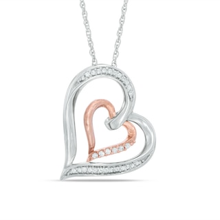 0.09 CT. T.W. Diamond Tilted Double Heart Pendant in Sterling Silver and 10K Rose Gold