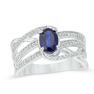 Oval Lab-Created Blue Sapphire and 0.18 CT. T.W. Diamond Wave Ring in 10K White Gold