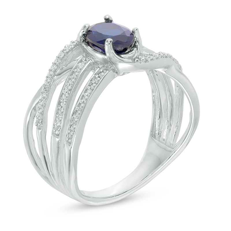 Oval Lab-Created Blue Sapphire and 0.18 CT. T.W. Diamond Wave Ring in 10K White Gold