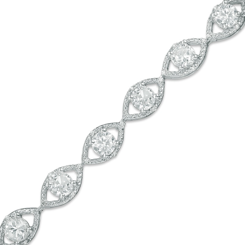 Lab-Created White Sapphire and 0.09 CT. T.W. Diamond Oval Link Bracelet in Sterling Silver - 7.5"|Peoples Jewellers