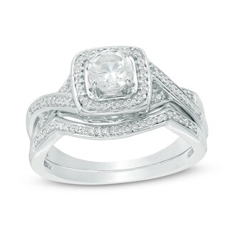 5.0mm White Lab-Created Sapphire and 0.11 CT. T.W. Diamond Frame Twist Bridal Set in Sterling Silver