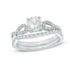 Thumbnail Image 0 of 6.0mm Lab-Created White Sapphire and 0.15 CT. T.W. Diamond Twist Bridal Set in 10K White Gold