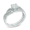 Thumbnail Image 1 of 6.0mm Lab-Created White Sapphire and 0.15 CT. T.W. Diamond Twist Bridal Set in 10K White Gold