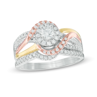 0.58 CT. T.W. Diamond Frame Swirl Bridal Set in 10K Tri-Tone Gold