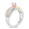 0.45 CT. T.W. Diamond Bypass Waves Bridal Set in 10K Tri-Tone Gold