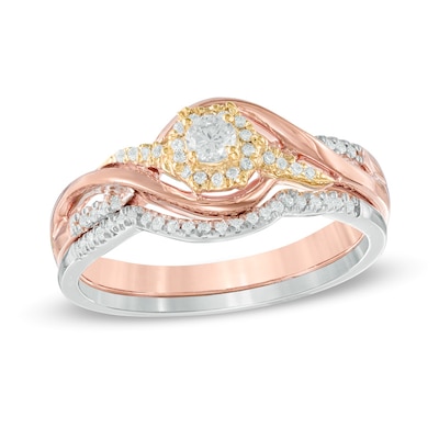 0.23 CT. T.W. Diamond Frame Swirl Bridal Set in 10K Tri-Tone Gold