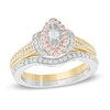 Thumbnail Image 1 of 0.45 CT. T.W. Diamond Marquise Frame Collar Bridal Set in 10K Tri-Tone Gold