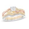 Thumbnail Image 1 of 0.45 CT. T.W. Diamond Twist Bridal Set in 10K Tri-Tone Gold