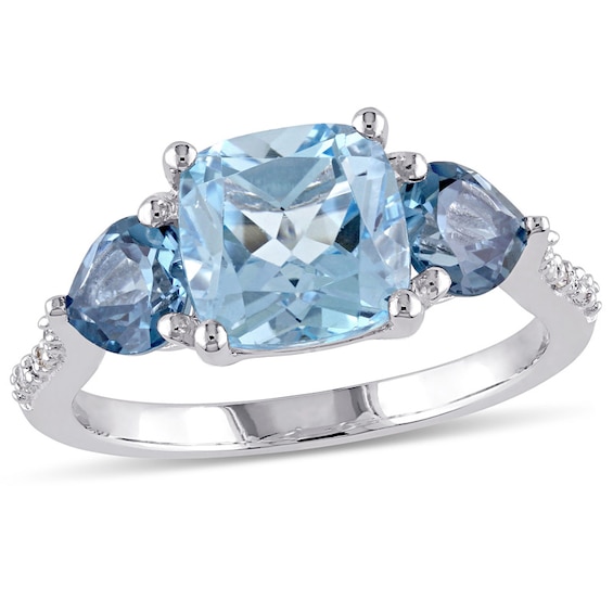 Blue Topaz and Diamond Accent Three Stone Ring in Sterling Silver