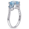 Blue Topaz and Diamond Accent Three Stone Ring in Sterling Silver