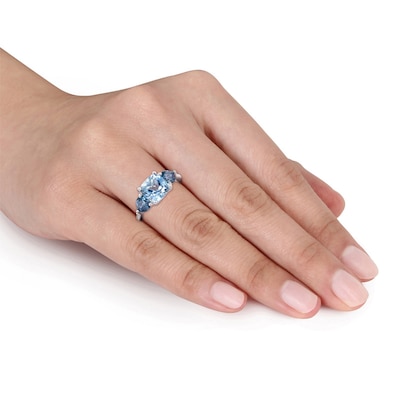 Blue Topaz and Diamond Accent Three Stone Ring in Sterling Silver