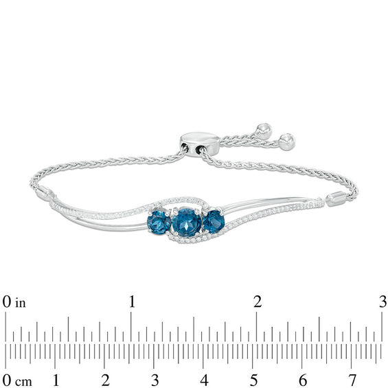 6.0mm London Blue Topaz and Lab-Created White Sapphire Three Stone Bypass Bolo Bracelet in Sterling Silver - 8.0"