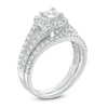 0.70 CT. T.W. Princess-Cut Diamond Cushion Frame Split Shank Bridal Set in 10K White Gold