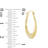 Thumbnail Image 2 of Textured Swirl Hoop Earrings in Hollow 14K Gold